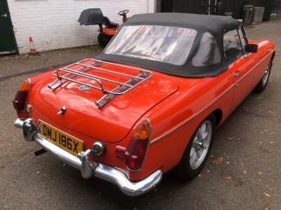 A 1982 MG MGB Sports car, soft top, historic vehicle, registration DMJ 186X, petrol, orange/red, first registered 08/04/1982, MOT expired 30/06/22. - 2