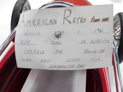 An American retro pedal car, modelled after a 1941 Alfa Romeo 158 Alfretta Formula 1 car, with rubber tyres, chrome trim and leatherette seat. - 3