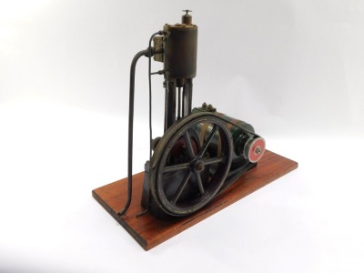 A vertical steam engine, with fly wheel and motor, on a wooden plinth, 60cm wide, 44cm high, 25cm wide. - 2