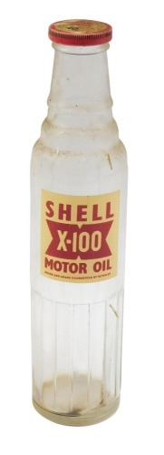 A Shell X100 motor oil glass bottle, 30cm high.