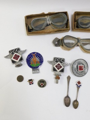 Automobile badges and trinkets, comprising Junior Car Club official armbands, Junior Car Club car badges and pin badges, commemorative spoons, three pairs of driving goggles and an Astra British Toys Microscope information pamphlet. (1 tray) - 2