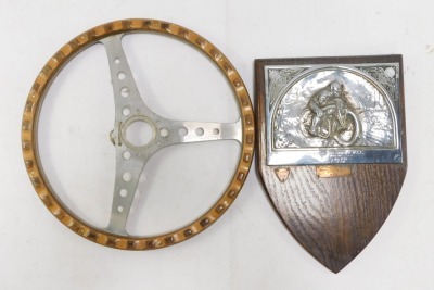 A motorcycle racing plaque for Newark & District MCC Club, won by R H Smith, 28/11/26, and a further presentations, silver plated on a oak shield mount, together with a steering wheel. (2) - 2