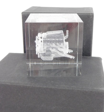 A laser crystal 3D image of a BMW M5 power unit, boxed with certificate.