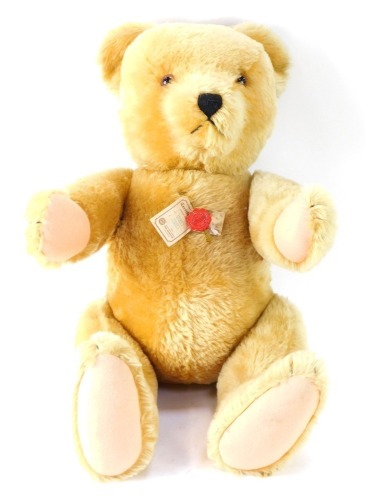 A large Herman blonde plush Teddy Bear, bearing label, 50cm high.