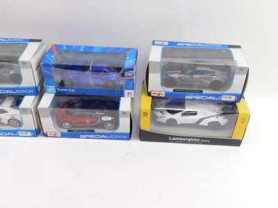 Ten diecast vehicles, 1:24 scale, comprising the Burago Ford Capri 1982, the Revell Gemballa Avalanche, Maisto 2017 Corvette Grand Sport (x2), Carousel Super Car, Maisto Bugatti Chiron, Braha Lamborghini Veneno, Maisto 2010 Chevrolet Camaro, Burago Porsch - 3