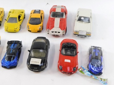 A group of diecast model vehicles, to include Motormax Lamborghini Gallardo Superleggera, Maisto BMW Z8, Burago Ferrari 250, yellow Lamborghini, Burago Bugatti 11GB, Motormax Aston Martin V12 Vantage, Burago Rolls Royce Camargue, and a Burago Ferrari GTO. - 3