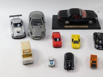 A group of diecast vehicles, to include the Beanstalk Group Aston Martin Vanquish, ambulance, Maisto Porsche Boxster, Motormax Mercedes Benz SLS AMG, Maisto Thunderbird Show Car, Maisto Mclaren F1 and various others. (1 tray 2 cars) - 2