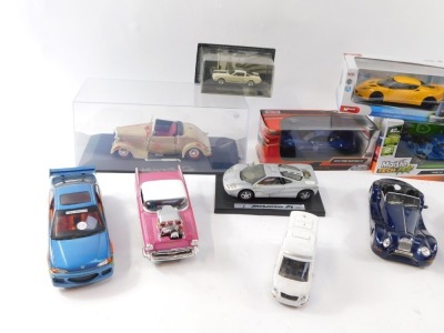 A group of diecast vehicles, comprising four boxed examples, Maisto Tech RLC Ford GT, Mondo Motors Silver Collection Evora S, a Motor Max 2018 Ford Mustang, unmarked cased model and a Ford Mustang Shelby GT 350 H, together with a group of loose model cars - 2