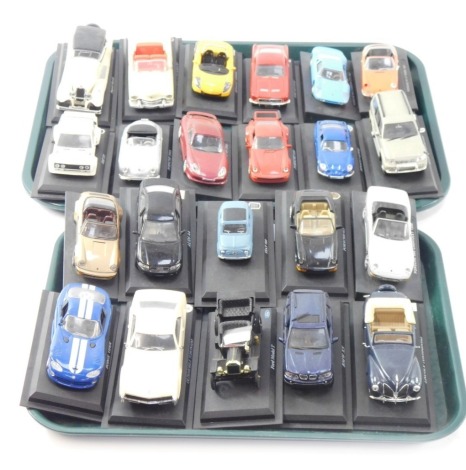 A collection of diecast cars, 1:18 scale, each mounted on plinth, to include Lincoln Continental, Porsche Cabriolet, BMW X5, Ford Model T, Oldsmobile Tornado, Dodge Viper, Fiat 500, Porsche 900, Renault Alpine, Toyota Landscruiser and others. (2 trays)