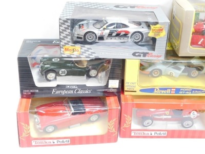 Eight diecast cars, 1:18 scale, comprising three Tonka Polistils, a Polistil Maserati 250F, a GT Racing Mercedes CLK GTR, Ertl European Champions 1956 Austin Healey 100SLX, Ford GT40 and a 1948 Jaguar XX20, boxed. (8) - 2