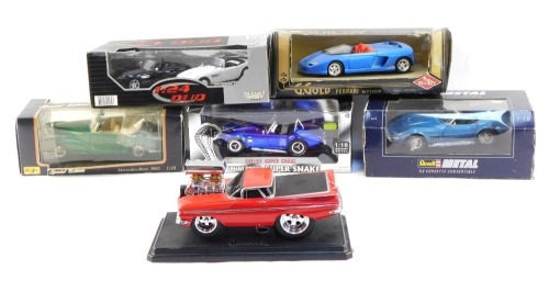 A group of diecast vehicles, 1:18 scale, comprising Maisto Mercedes Benz 300S, Shelby Cobra Super Snake, a Revell 69 Corvette Convertible, Motormax twin car set, Guiloy Ferrari Mythos, and a Muscle Machines American Muscle car, mainly boxed. (6)