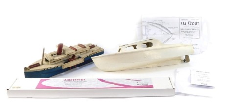 Two painted wooden boats, comprising blue, cream and red painted tug boat, 54cm long, and a white painted speedboat, 61cm long, and an Amethyst Towl Line glider. (3)