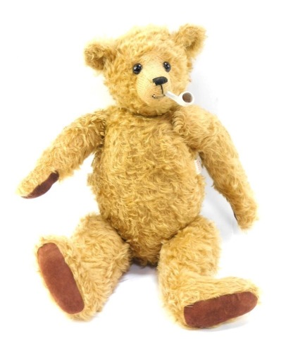 A Portobello Bear Company blonde plush jointed Teddy Bear, formed smoking a pipe, 63cm high.