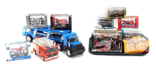 Diecast vehicles, comprising a Big Movers transport, pottery fire engine, Harley Davidson motorcycle, Welly Triumph, Seacal agricultural car, E Type Jaguar, Country Wares, Ducati and others bicycles, etc. (1 tray plus)