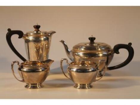 A George VI silver four piece tea service by G. Bryan & Co.