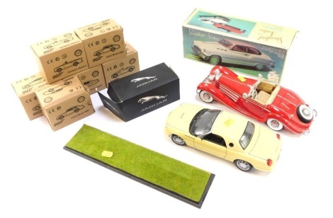 Diecast vehicles, comprising Shell 007 Range, BMW Z3 Roadster, Lotus E Spirit, Aston Martin DBS, Aston Martin DB5 (x2), and a Sunbeam Alpine 5, a Standard Voitur, boxed, Jaguar Atlas Editions model, Maisto Thunderbird, 1:18 scale, and a Maisto Mercedes Be