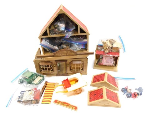 A Sylvanian Family house, and various accessories, to include Sylvanian Family figures, furniture, post office, toy shop, etc. (a quantity)