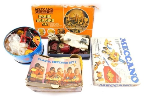 A Meccano car, plastic Meccano Set No 3, vintage Meccano, Meccano Multikit Crane Building Set and others. (1 box 1 tin and a presentation box)