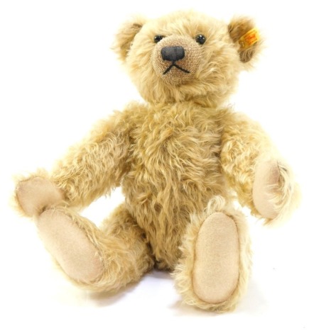 A Steiff plush blonde jointed Teddy Bear, 42cm high.