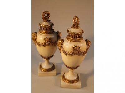 A pair of 19thC French white marble pot-pourri vases