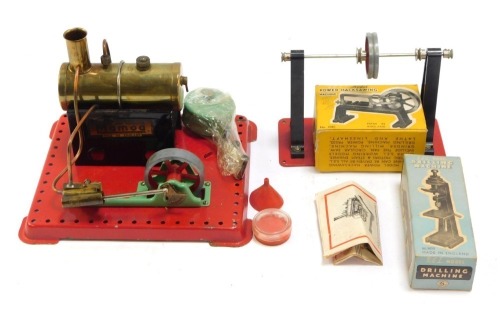 A Mamod steam traction engine, drilling machine and a power hacksaw, with two boxes. (1 box)