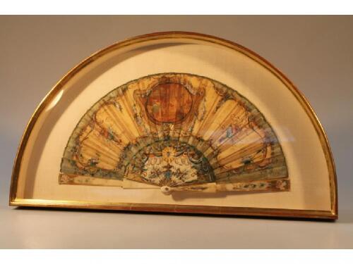 A 19thC fan with painted neo-classical scenes and pierced ivory sticks