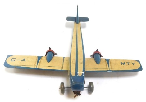 A tin plate aeroplane.