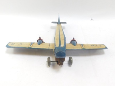 A tin plate aeroplane. - 2