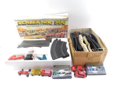 A Scalextric 300 cased set, additional Scalextric track, cased vehicles, C129 and C131, etc. (2 boxes) - 2