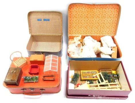 A group of doll's house furniture, together with three vintage suitcases.