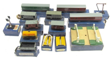 Hornby Dublo carriages and signalling wagons, comprising three D14 Suburban coaches, SD6 wagon Frein, 3460 level crossing, ES6 (x2) and ES7 colour light signals, water set, tank wagon, etc, all boxed. (1 tray)