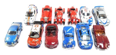 Twelve diecast vehicles, comprising Burago Prima Giugiaro, Ferrari 250 Testarossa, two Burago Alfa Romeo 2300, Burago Alfa Romeo 2300 Spider, Burago Viper GTS Coupe, Burago Citroen Exara WRC, Burago BMW Roadster, Burago A Alpine AA1, Bugatti 11, and Ford 