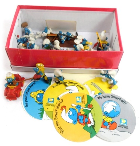 Twenty two National Benzole Smurfs, from 1978 Series, to include racing car, ski-ing, fisherman, doctor, clown, Batman, piper, drummer, and others, together with a group of stickers. (1 box)