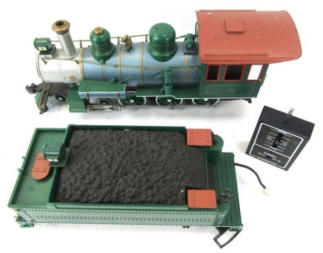 A Bachmann battery powered G scale locomotive and tender, Atchison Topeka Santa Fe, with remote.