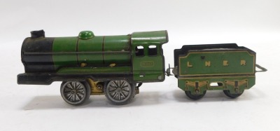 A tin plate locomotive and tender, carriage number 490 LNER green livery. - 4