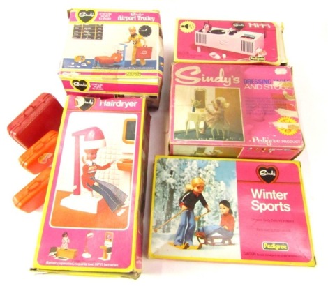 Collectables, comprising Sindy hairdryer, hi-fi, airport trolley, Winter Sports, and three Sindy suitcases, four boxed. (7)