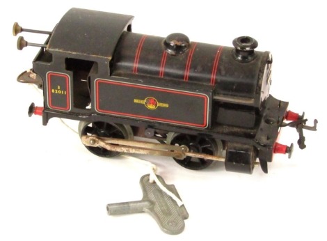 A tin plate Hornby British Railways type 40 clockwork locomotive, with key in black livery.