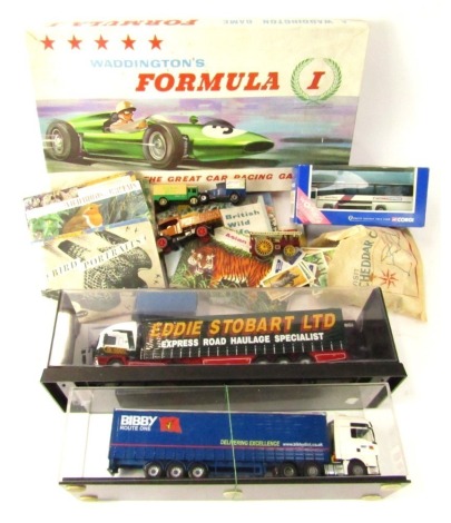 Toys and models, comprising a Bibby Route One lorry, Eddie Stobart Arctic, a Formula One Waddingtons game, Corgi die cast bus, various tea cards and loose playworn cards. (a quantity)