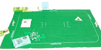 A Subbuteo table cricket set, comprising plastic fence surround, Subbuteo throw in figures and a Subbuteo table cricket score board, 00 scale fielders and mats, playing instructions, etc. (1 box)