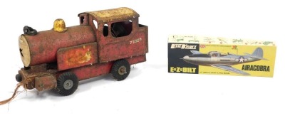 A child's tin plate locomotive, in red numbered 7300 and Keel Craft Eezebilt kit built plane, boxed. (2, AF)