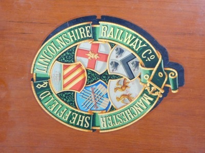 A Manchester Sheffield and Lincolnshire Railway Company transfer applied crest, on wooden mounted frame, 36cm x 30cm.