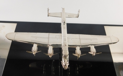 An Elizabeth II silver Bomber Command memorial plaque, formed as a Lancaster Bomber, on a plinth base dedicated to the men and women of Bomber Command 1939 - 1945, the aeroplane London, 2007, 53cm wide. - 3