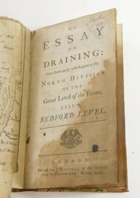 Fens.- AN ESSAY ON DRAINING...THE GREAT LEVEL OF THE FENS CALLED THE BEDFORD LEVEL, folding engraved map with loss at folds, contemporary half calf over patterned boards, 8vo, 1729. - 4