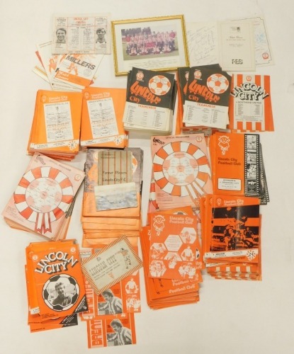 Various Lincoln City FC football programmes, mainly home matches, late 1970s and 1980s to include Vs Accrington Stanley, a recollections booklet, black and white team picture, etc. (a large quantity)