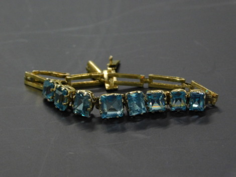 A ladies yellow metal bracelet