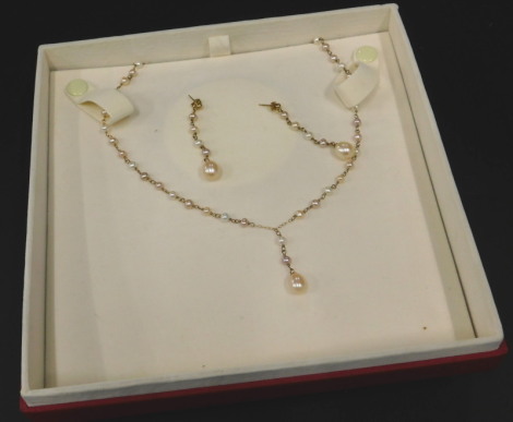 A 9ct gold pearl necklace and earring set