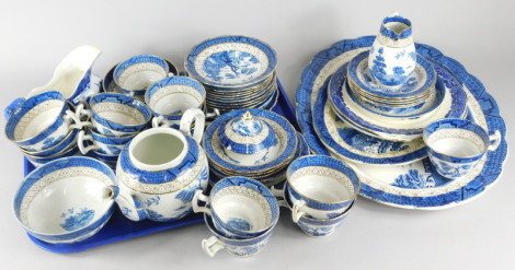 A large quantity of Booths Real Old Willow pattern tea and dinnerware