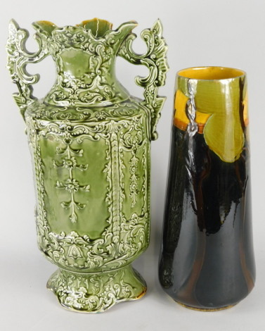 A large Continental majolica glazed two handled vase