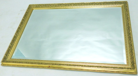 A modern gilt wall mirror