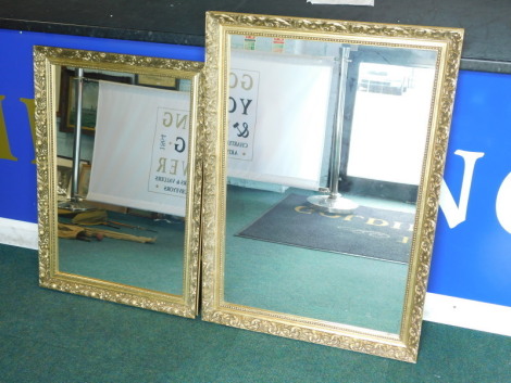 Two similar gilt rectangular wall mirrors